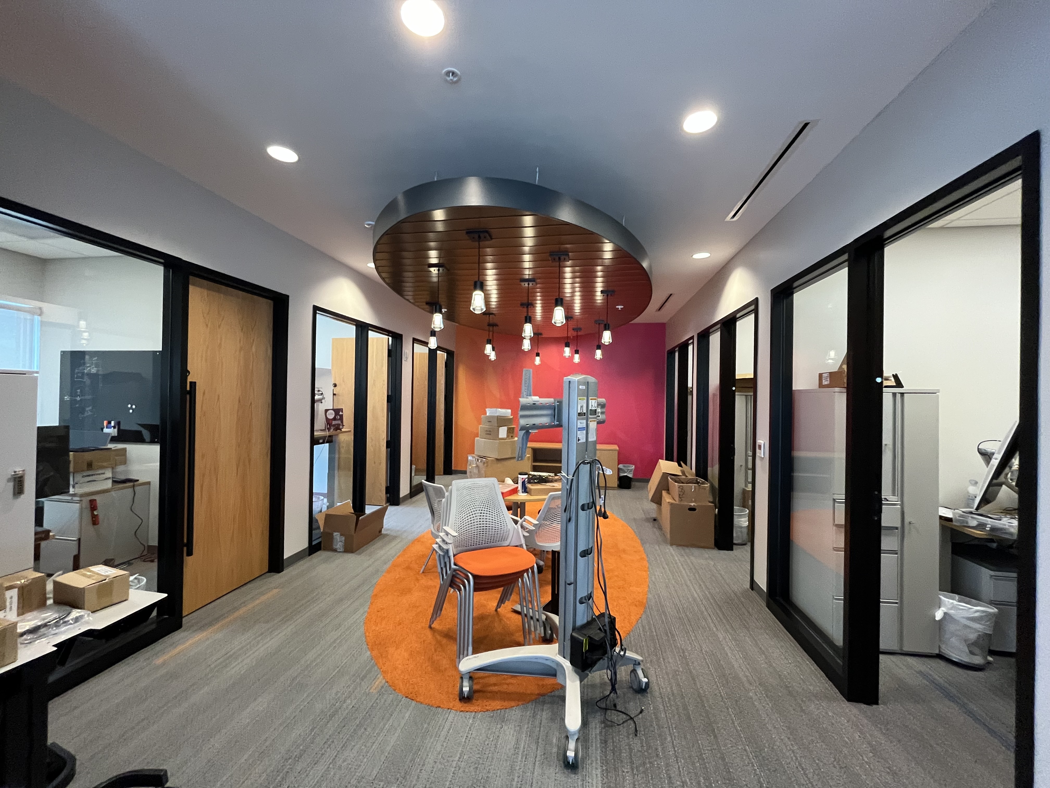 Commercial office corridor interior painting magenta accent wall by HPC Jacksonville Florida