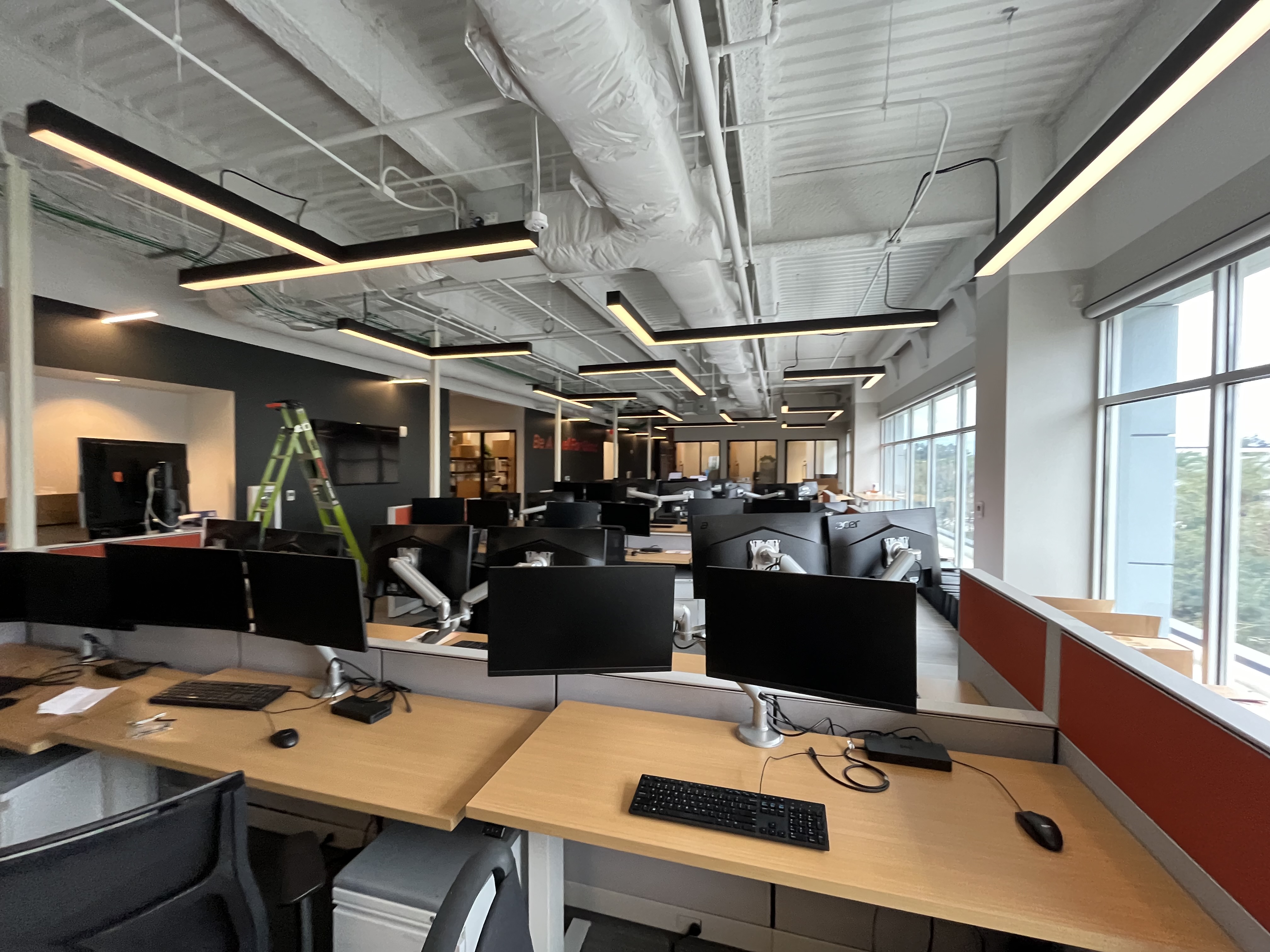 Large open plan office interior painting charcoal walls by HPC Jacksonville Florida