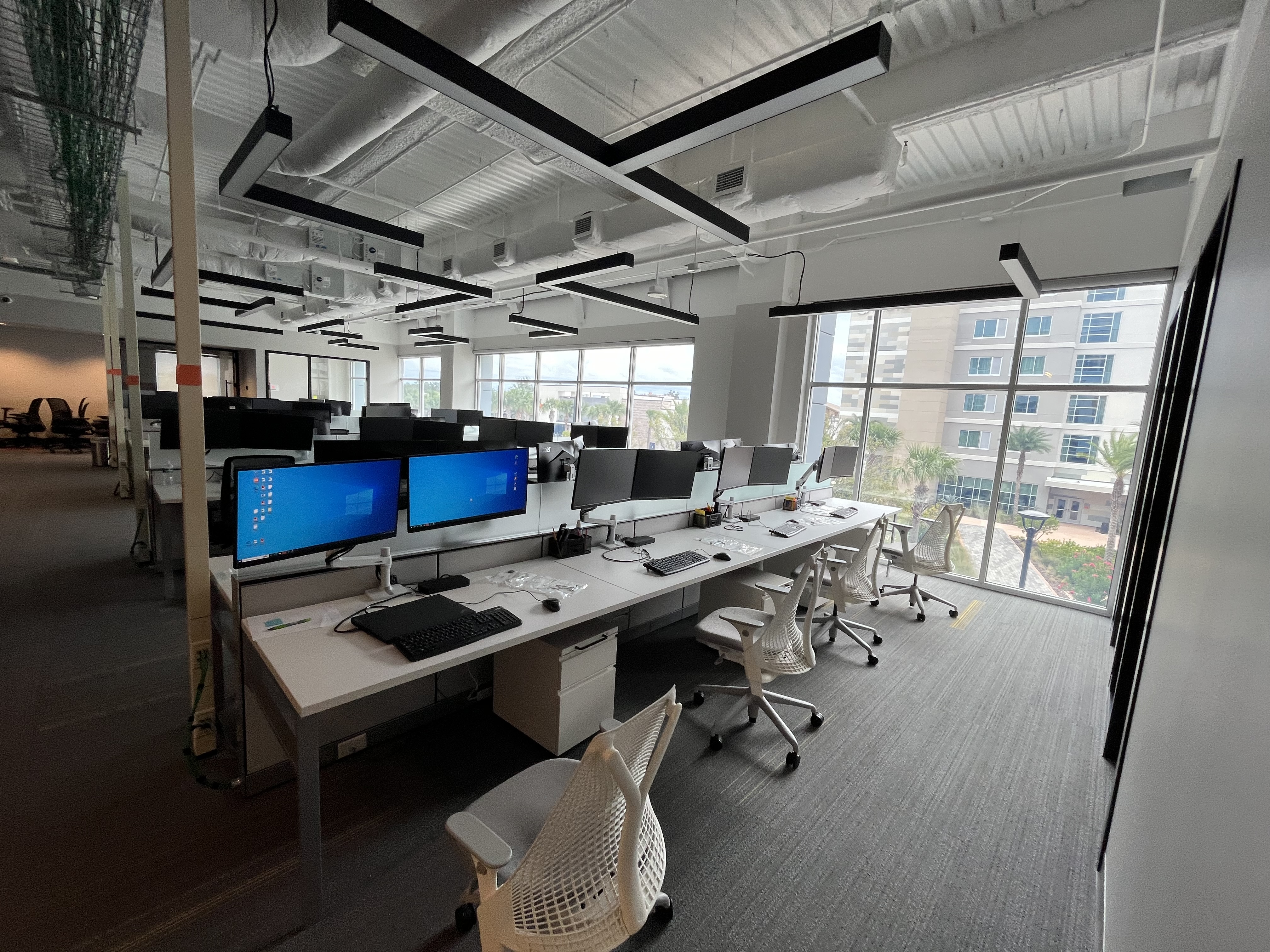Corporate office floor interior painting white gray by HPC Jacksonville Florida