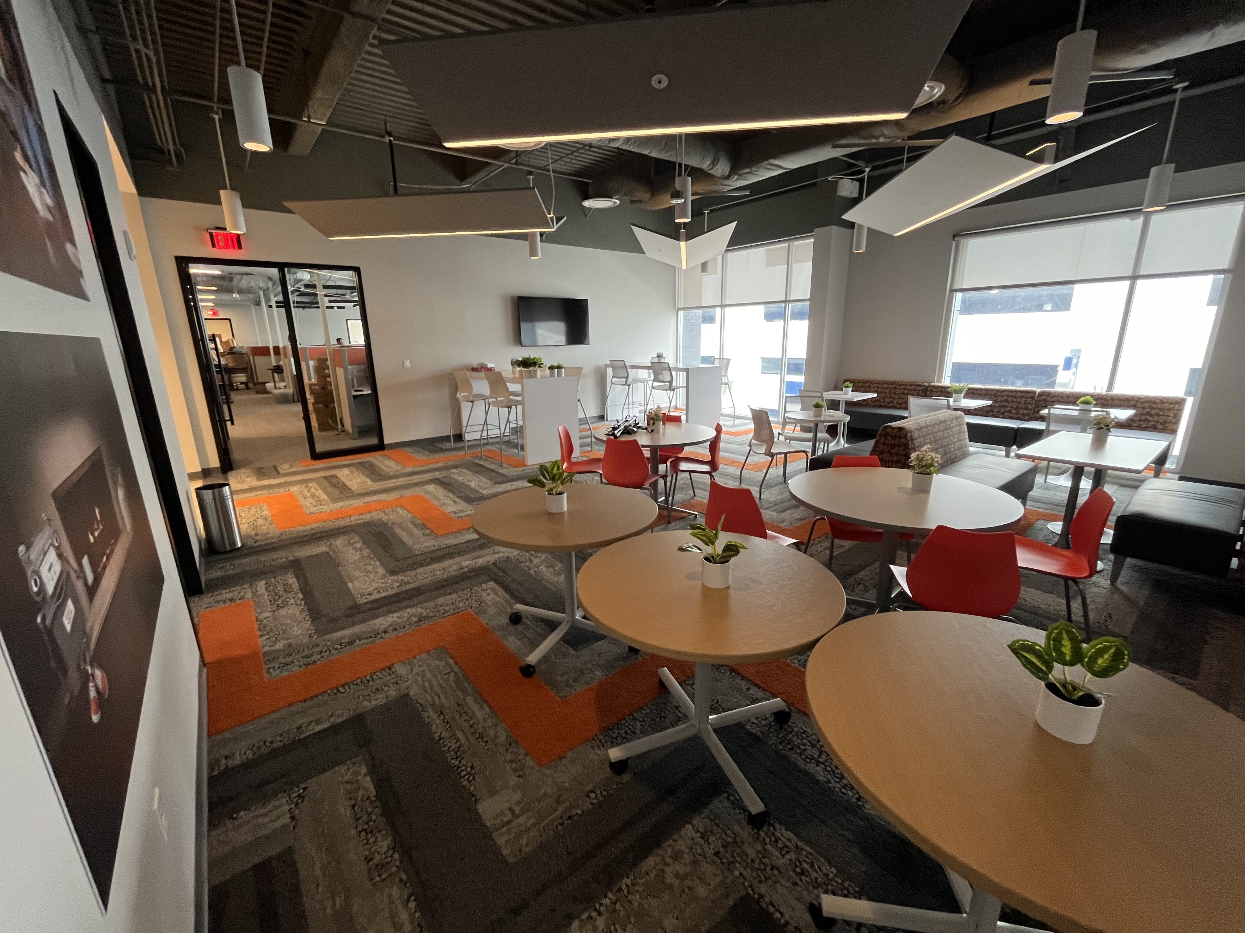 Corporate cafe lounge interior painting white walls by HPC Jacksonville Florida