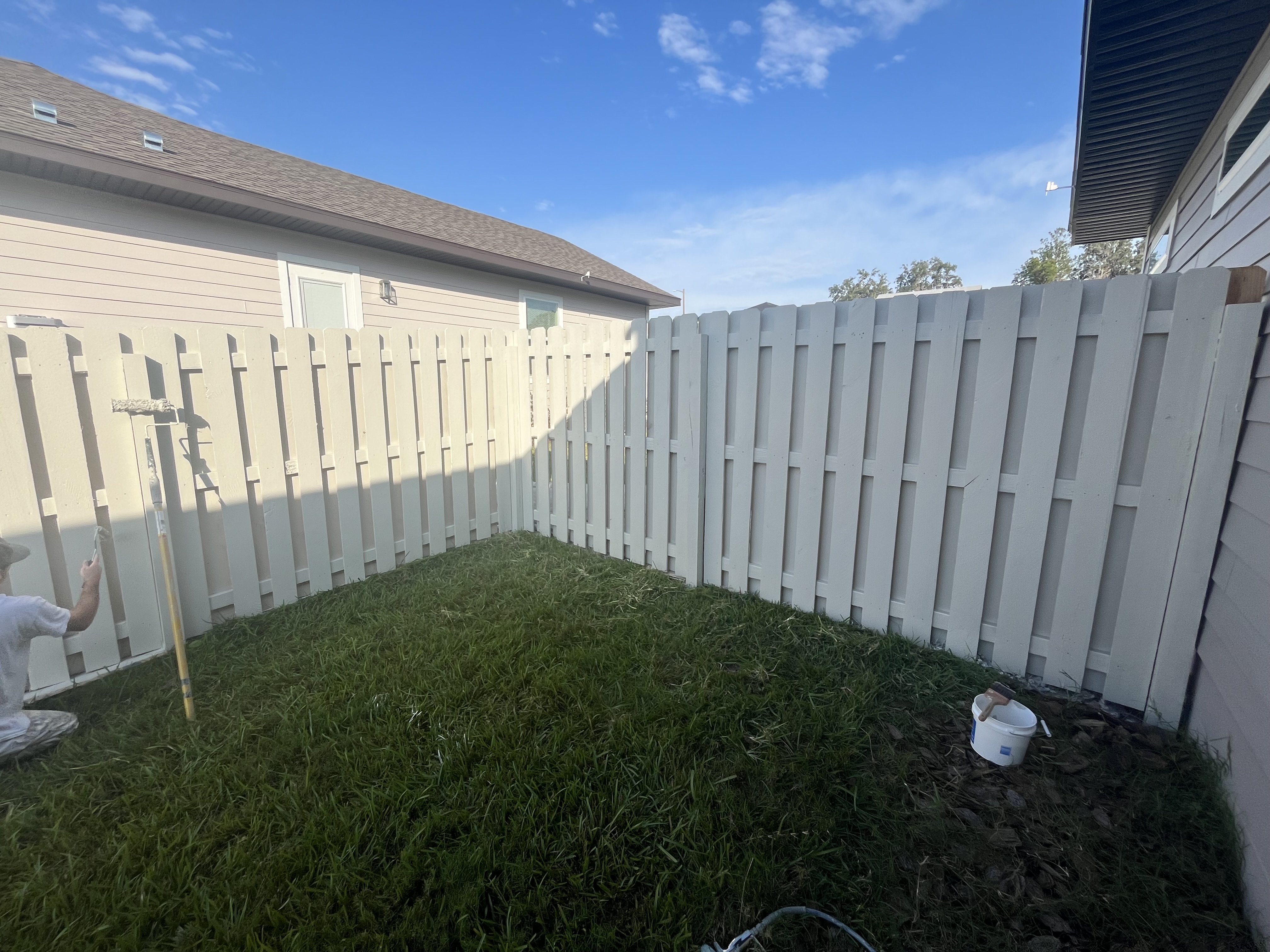 Beach house side exterior painting aqua railings by HPC in St. Augustine Florida