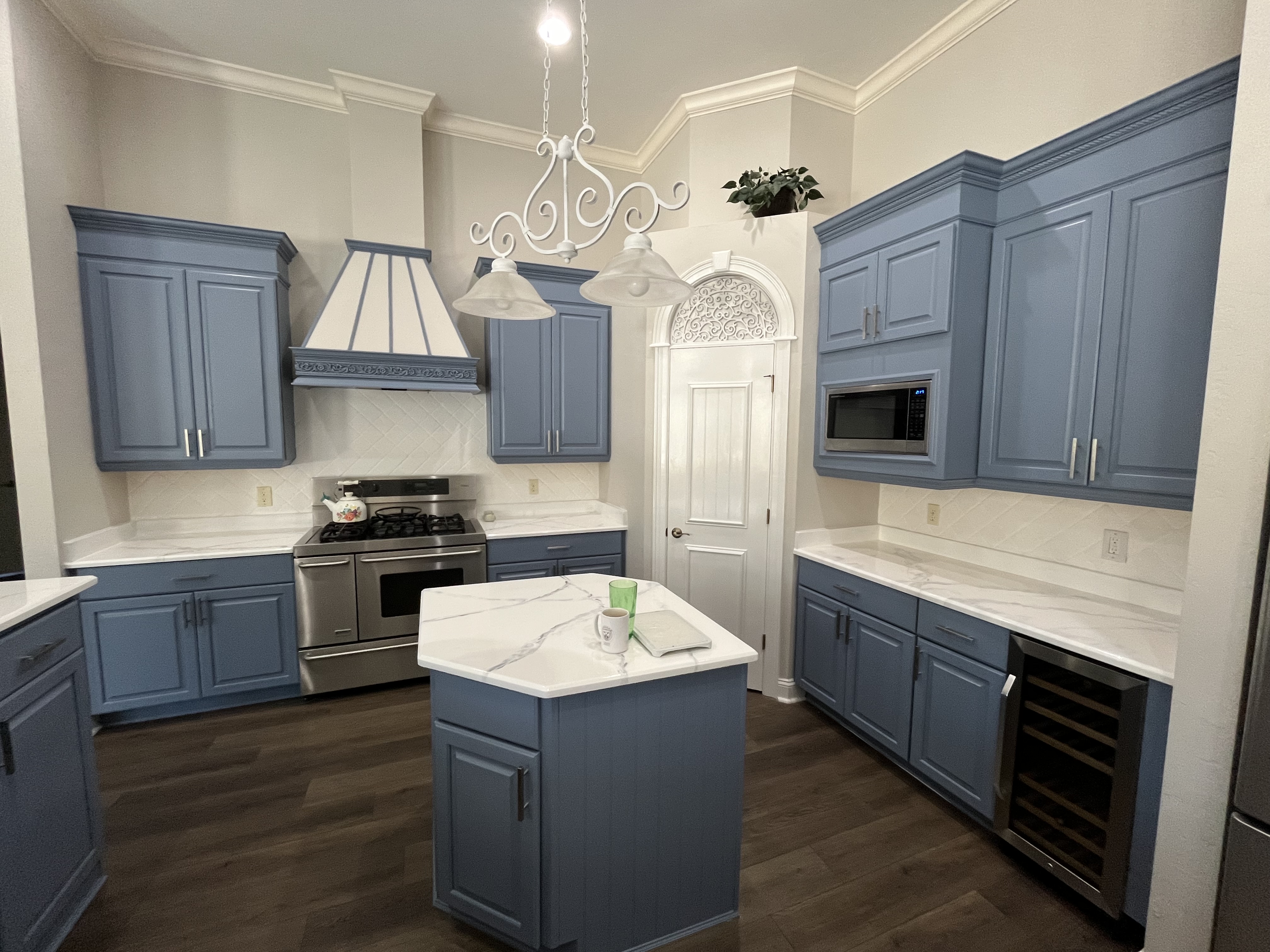Kitchen cabinet refinishing completed slate blue by HPC Florida