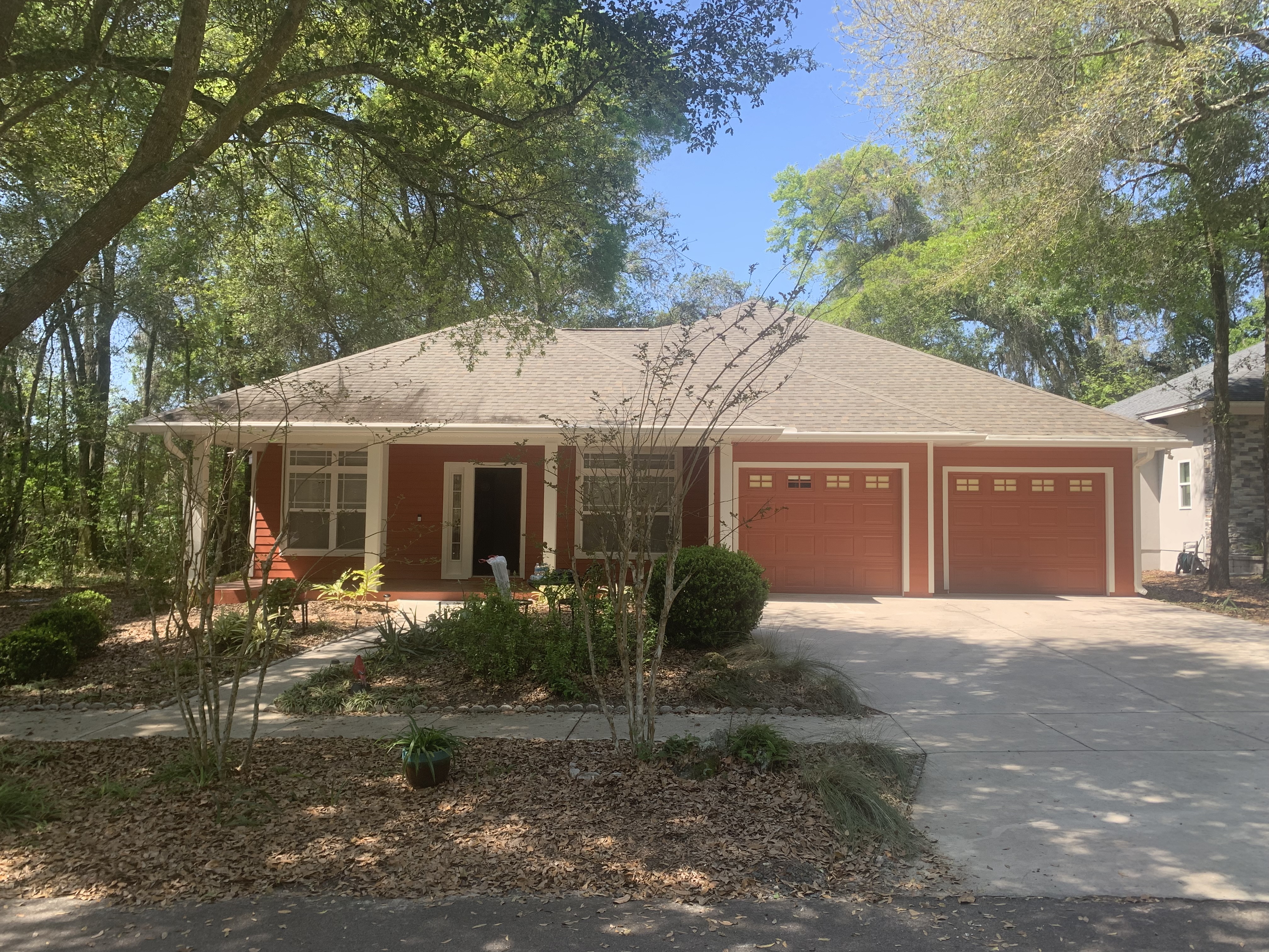 Ranch home exterior painting terracotta finish by HPC in Ocala Florida