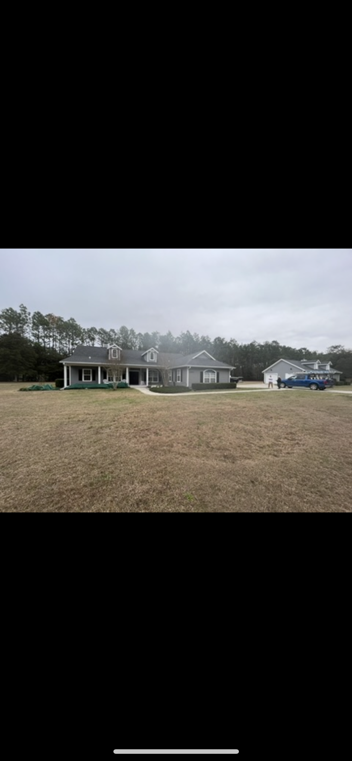 Country estate home exterior painting gray siding white trim by HPC in Ocala Florida