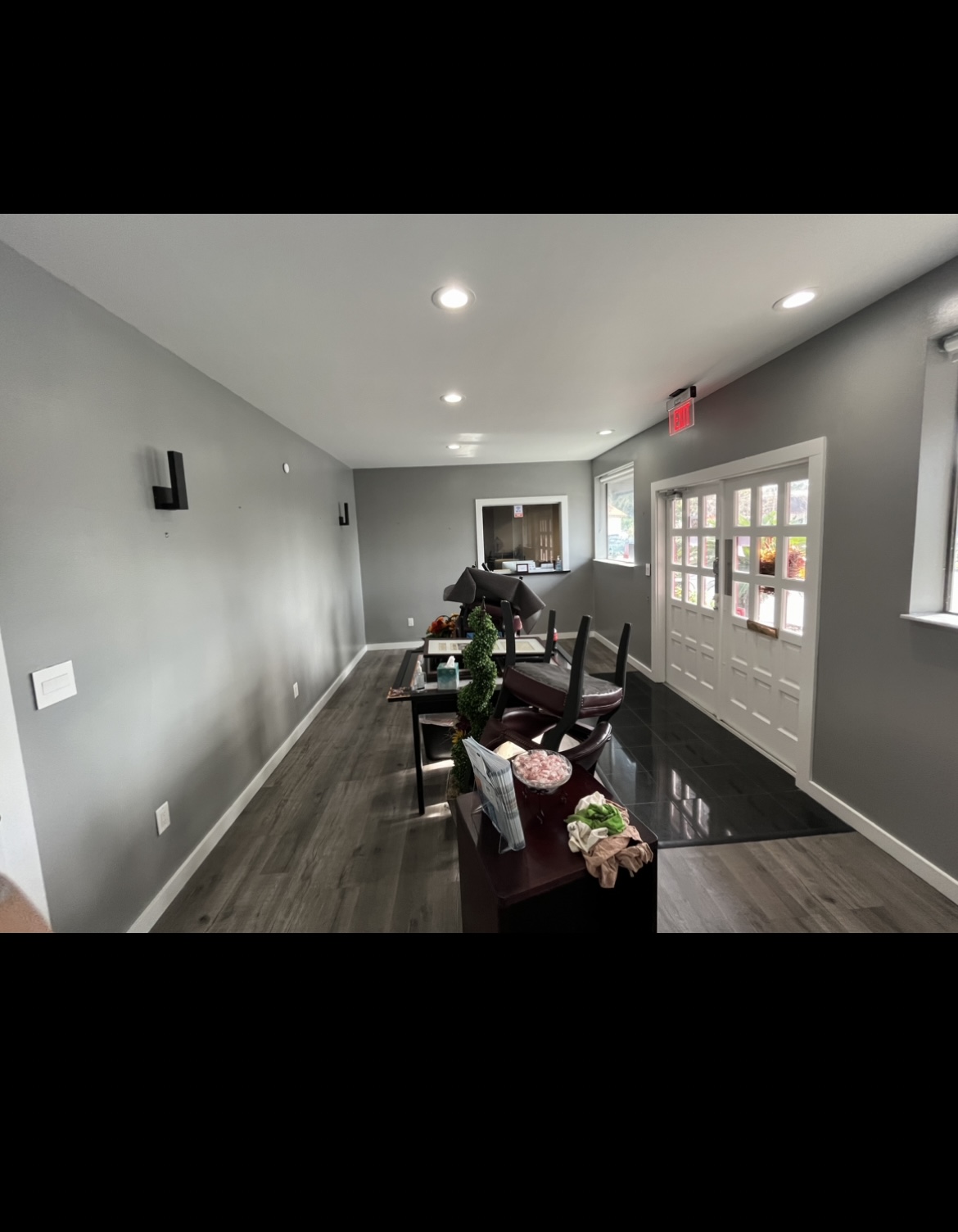 Small commercial office interior after painting gray walls by HPC Florida