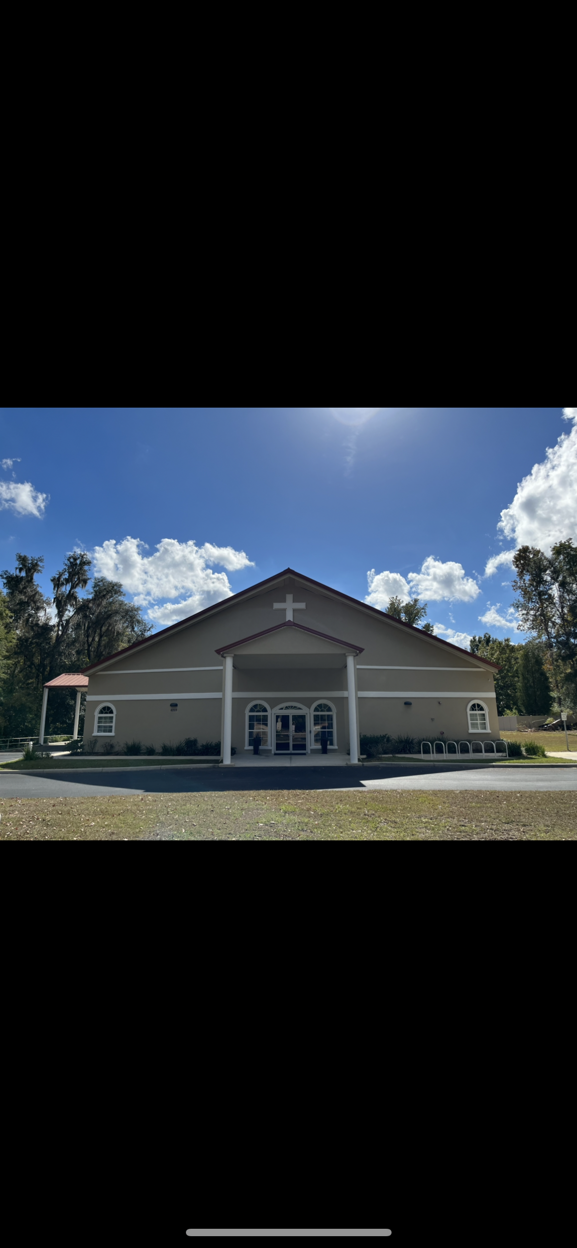 Church exterior painting tan stucco white trim by HPC in Gainesville Florida