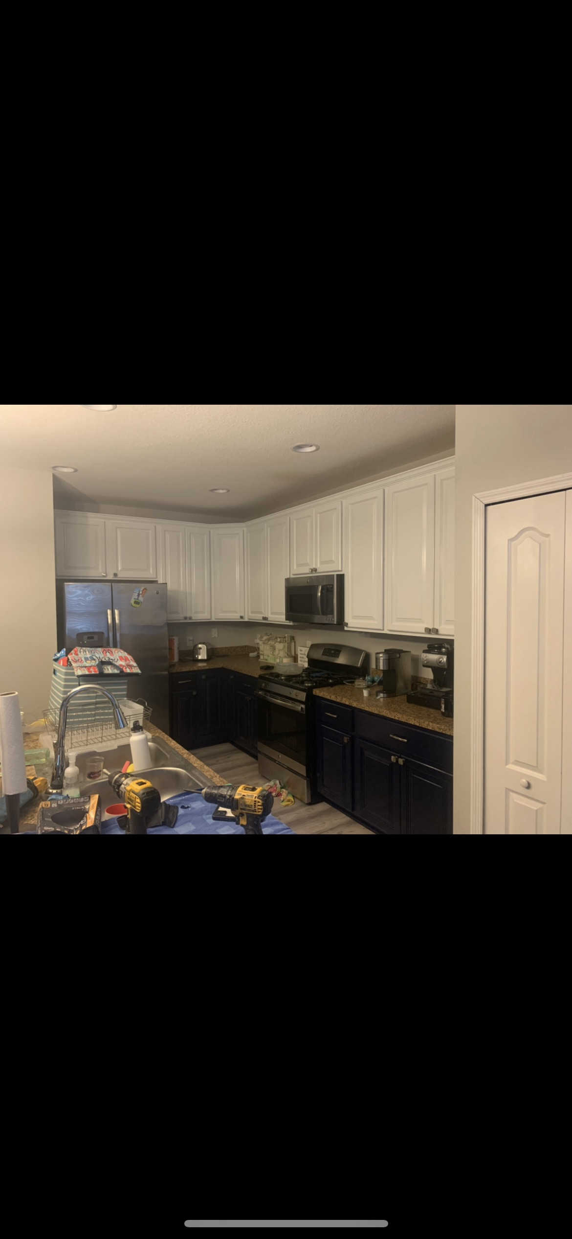 Delta Tau fraternity house exterior painting boom lift by HPC in Gainesville Florida