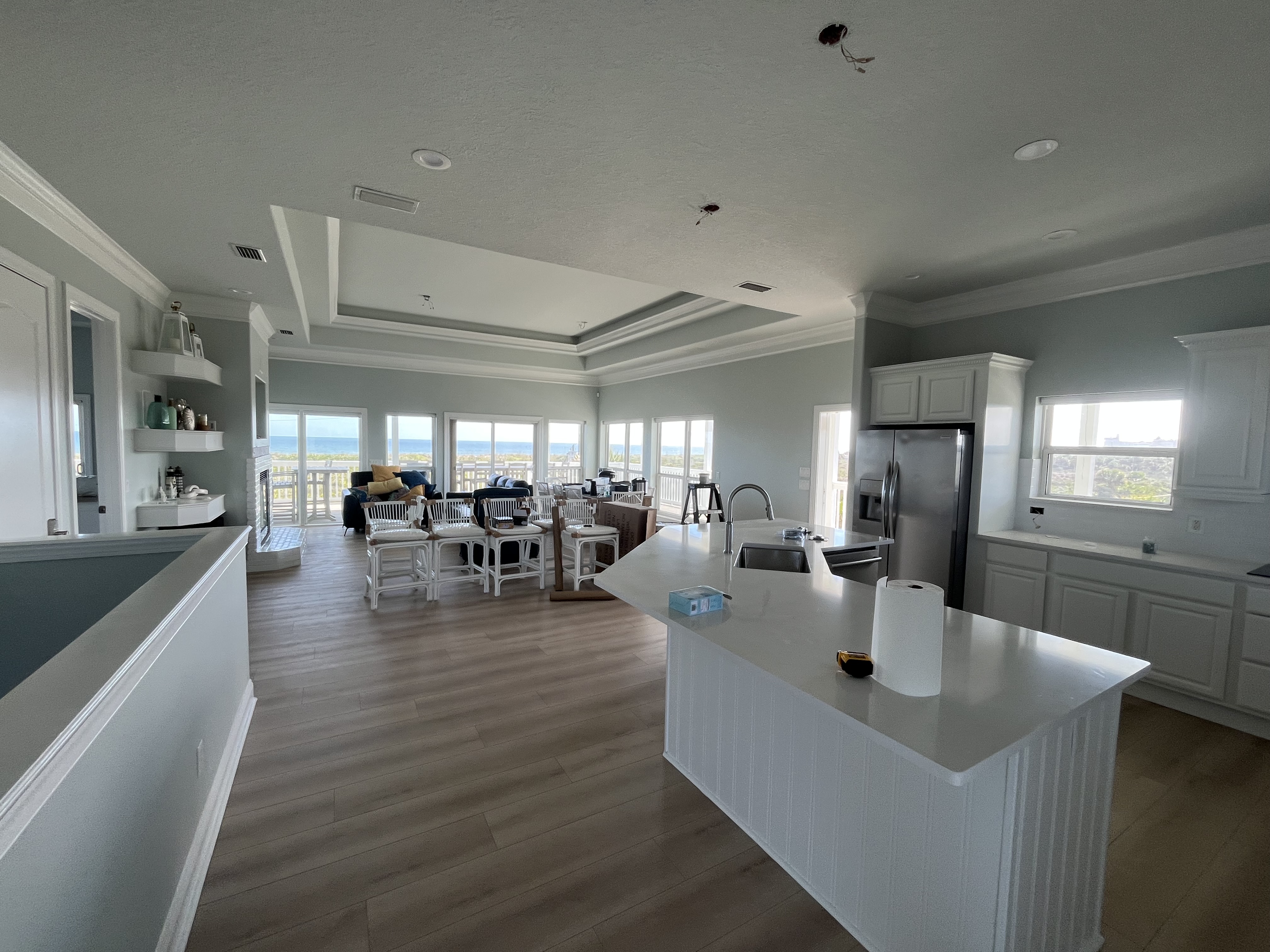 Beach house living room interior painting blue gray walls ocean view by HPC in St. Augustine Florida